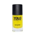 Refect Beauty Yolo Nail Polish in a vibrant yellow creamy shade with a sleek black cap in a glass bottle.