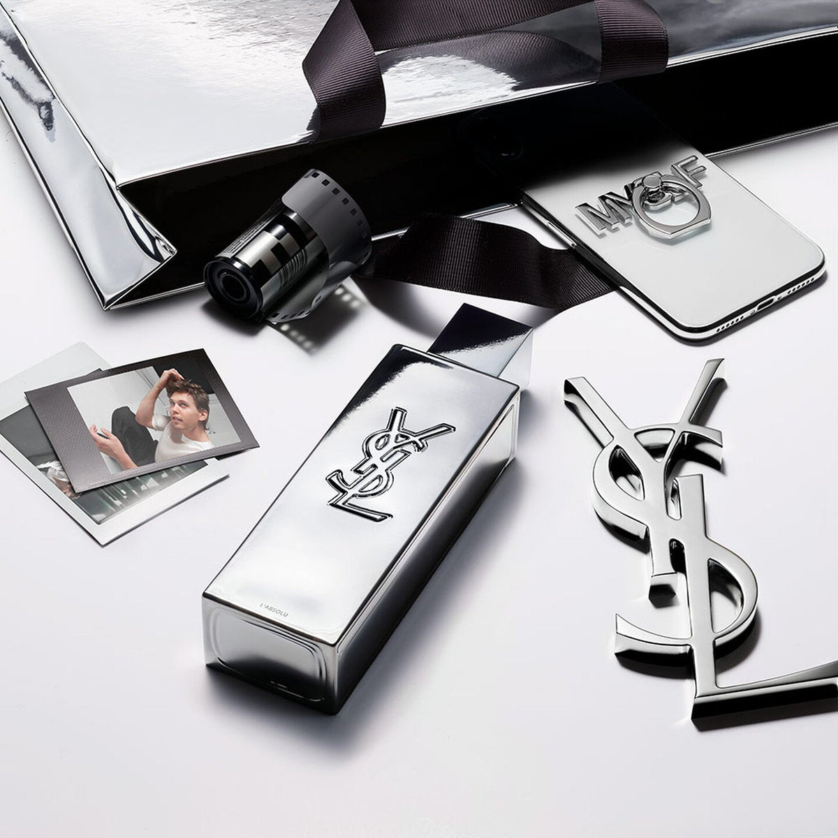 Refect Beauty Yves Saint Laurent MYSLF L'ABSOLU fragrance bottle with metallic mirror finish and YSL logo