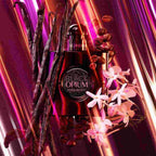 Refect Beauty Yves Saint Laurent Black Opium Le Parfum bottle surrounded by vanilla beans, coffee, and jasmine flowers