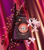 Refect Beauty Yves Saint Laurent Black Opium perfume bottle surrounded by coffee beans, vanilla pods, and jasmine.