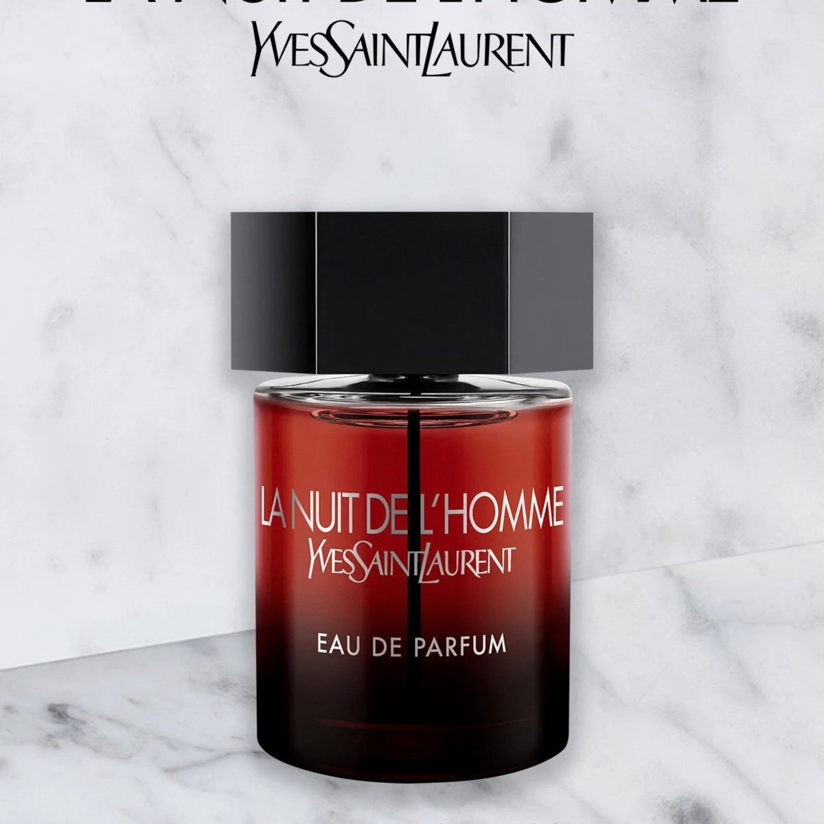 Refect Beauty Yves Saint Laurent La Nuit De L'Homme Eau de Parfum in a dark red cylindrical bottle with a black cap.
