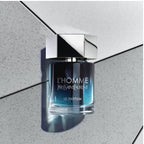 Refect Beauty Yves Saint Laurent L'Homme Le Parfum bottle with a blue gradient glass and metallic cap on grey surface