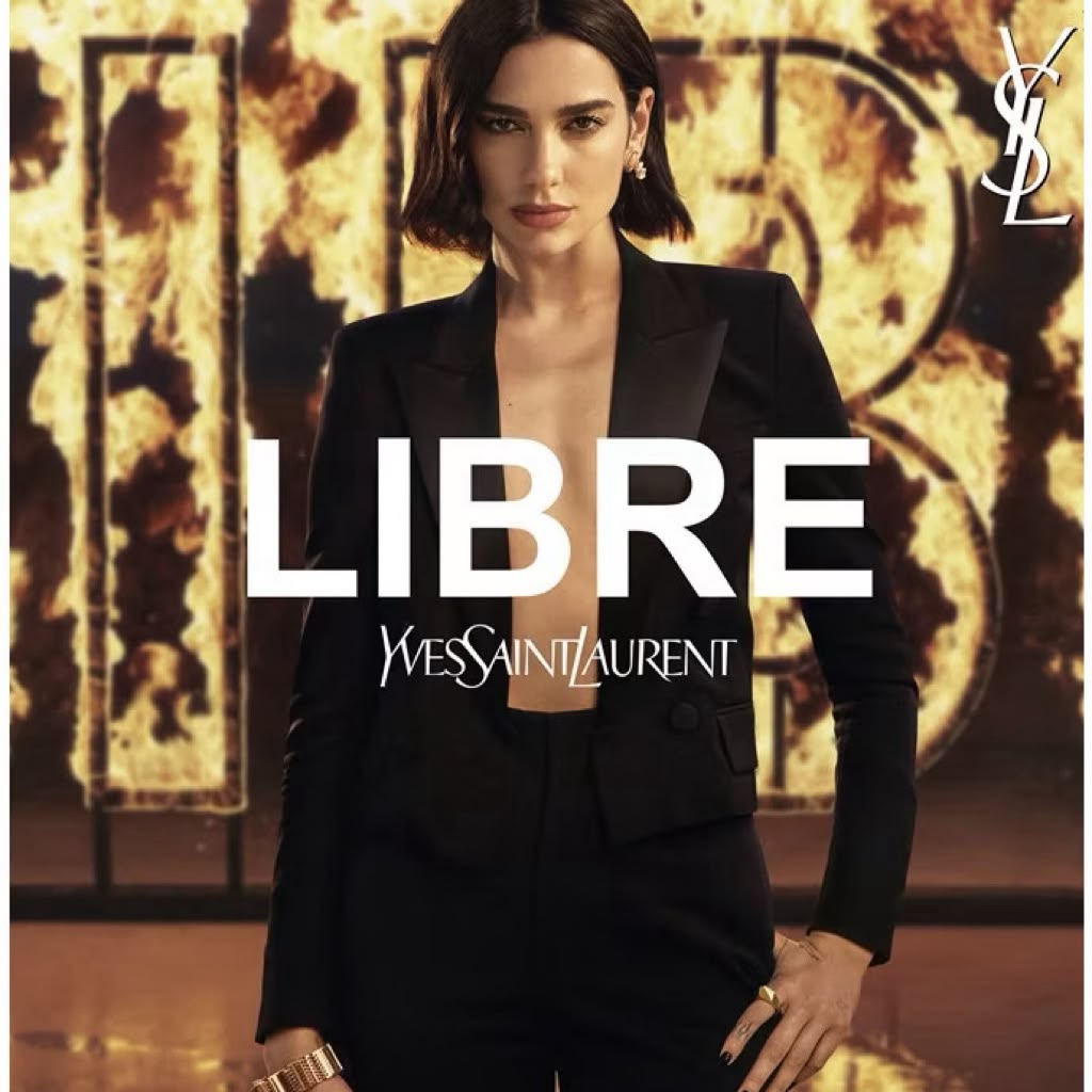 Refect Beauty campaign featuring Dua Lipa in a black blazer promoting Yves Saint Laurent Libre Intense perfume